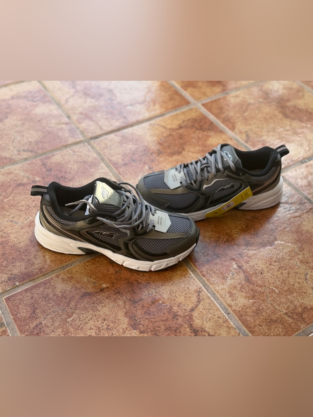 Size 9 Men’s And Women’s 10.5 Avia Gray and White Running Sneakers